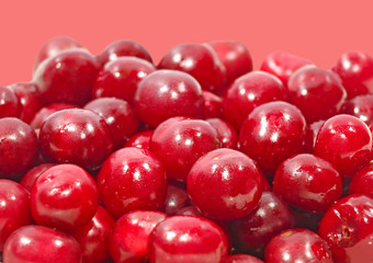 A lot of cherry berries taken closeup.Food background.