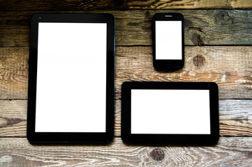 три планшета на старых досках