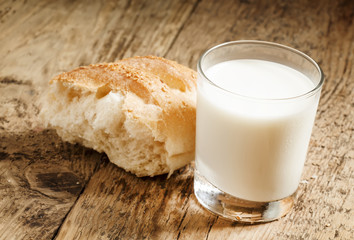 Fresh milk and white bread, selective focus