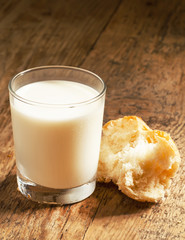 Fresh milk and white bread, selective focus