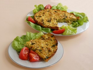 potato and mushrooms pancake with tomato and lettuce