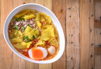 noodle soup on wood background