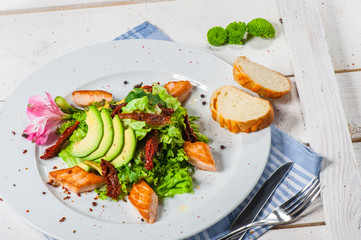 Salad with fried salmon