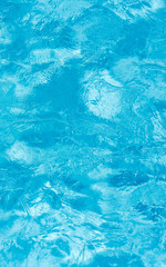 Blue pool water background.