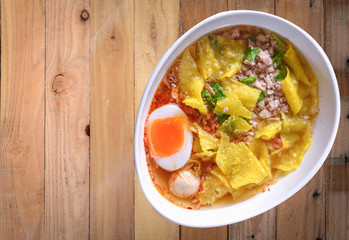 noodle soup on wood background