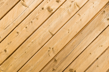 Sichtschutz aus schrägen Holzlatten, Hintergrund