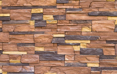 the texture of the stone facade of the building