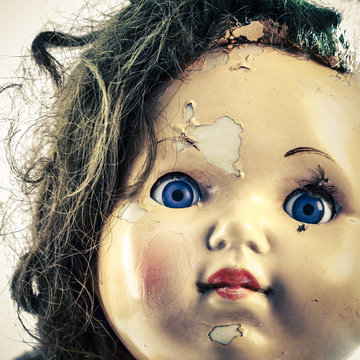 head of beatiful scary doll like from horror movie