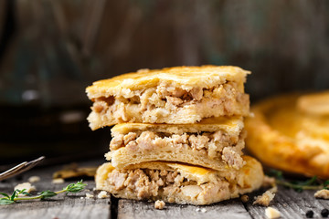 Homemade pie stuffed with chicken ang eggs