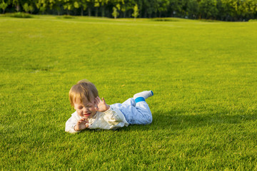 Fototapeta premium Little baby on the glade.