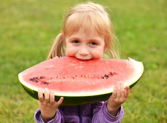 Girl eating melon