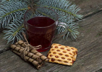 Obraz na płótnie Canvas the glass of drink decorated with a fir-tree branch a still life on drinks