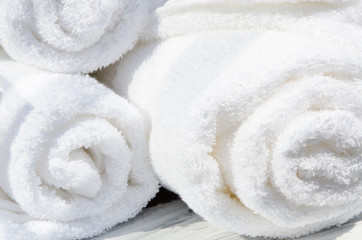 Obraz na płótnie Canvas White SPA towels in a set with accessories for the bath