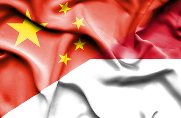 Waving flag of Monaco and China