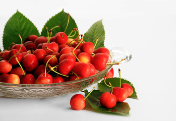 Cherries on the glass plate