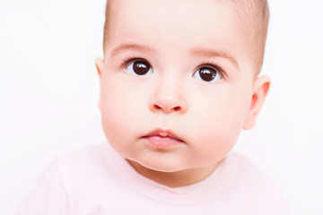 Close-up portrait of a beautiful sleeping baby on white