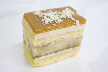  banana caramel cake on white plate.
