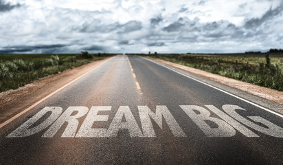 Dream Big written on rural road