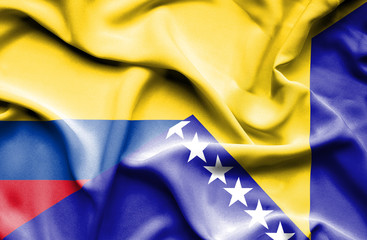 Waving flag of Bosnia and Herzegovina and Columbia