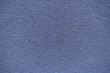 Blue revetment wall putty macro texture background