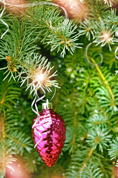 Christmas toy pine cone on the tree