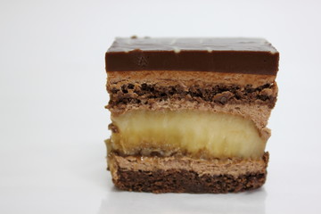  Chocolate sponge cakes on white plate.