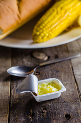 Butter with corn and bread