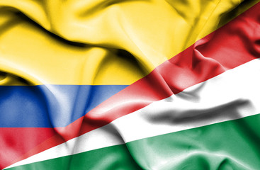 Waving flag of Seychelles and Columbia