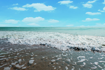 Wave of the sea on the sand beach