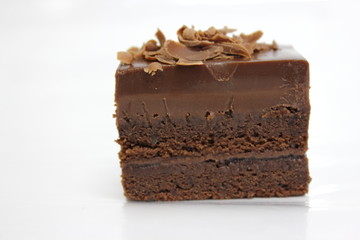  Chocolate sponge cakes on white plate.