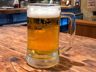 Beer in glass on table
