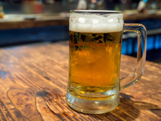 Beer in glass on table