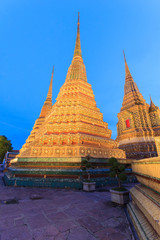 Fototapeta premium Wat Pho, Bangkok, Thailand. Also known as Wat Phra Chetuphon, 'Wat' means temple in Thai. The temple is one of Bangkok's most famous tourist sites. The temple has it's origins dating back to 1788.
