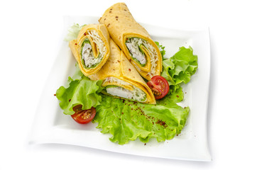 fresh  tortilla wraps with vegetables on the plate