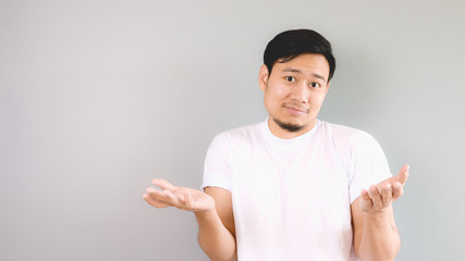 Rasing his shoulder and arms as the decision and choise  is up t