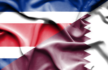 Waving flag of Qatar and Costa Rica