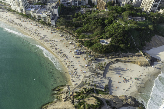 Top aerial view of Arpoador Peninsula Beach in Rio De Janeiro