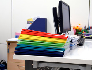 Plastic ridge folders on the table