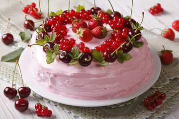 homemade cake with fresh berries on a plate close-up. horizontal
