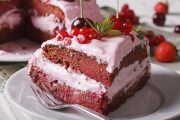 piece of homemade cake with fresh berries close-up. Horizontal
