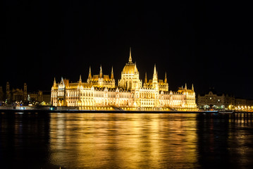 Fototapeta premium The Hungarian Parliament Building with bright and beautiful illu