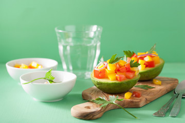 avocados stuffed with tomato pepper salad
