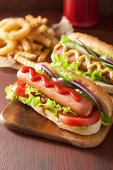 hotdog with ketchup mustard and vegetables