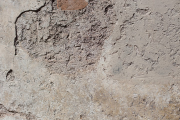 old gray textured background from destroyed wall