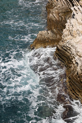 Rocky shore of the turquoise sea