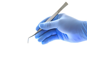 Doctor's hand holding tweezers with clipping path