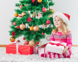 Happy Little Girl with Christmas Gift