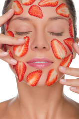 Beautiful woman with mask of strawberries