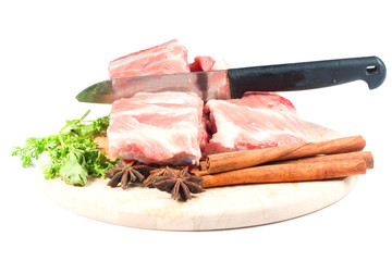 Raw Pork Ribs ,coriander, star anise, Cinnamon sticks on white background 
