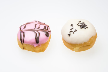 Strawberry flavored donut and white Chocolate flavored donut